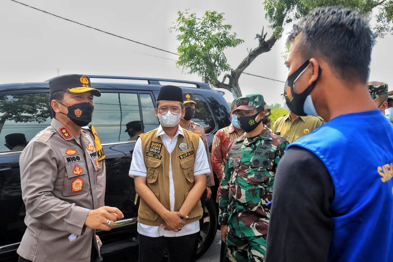 Cegah Penyebaran Covid-19, Polda Jatim Kerahkan Pasukan di Zona Merah Bangkalan